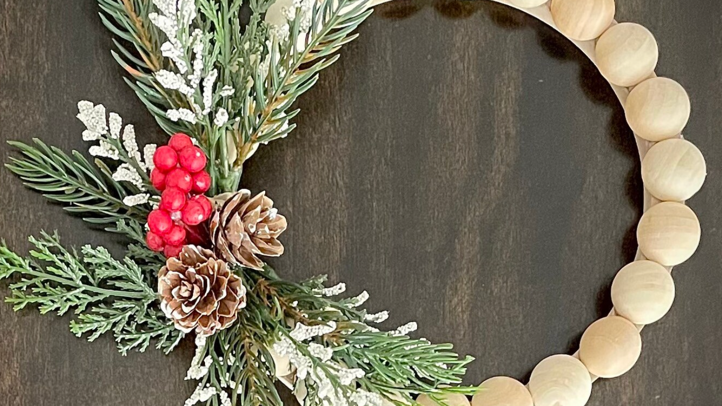 Wood_Bead_Wreath_with_Pinecone_and_Red_Berry_Accent